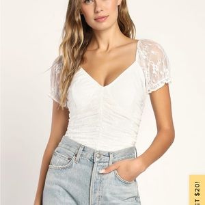 Lulu’s white lace bodysuit